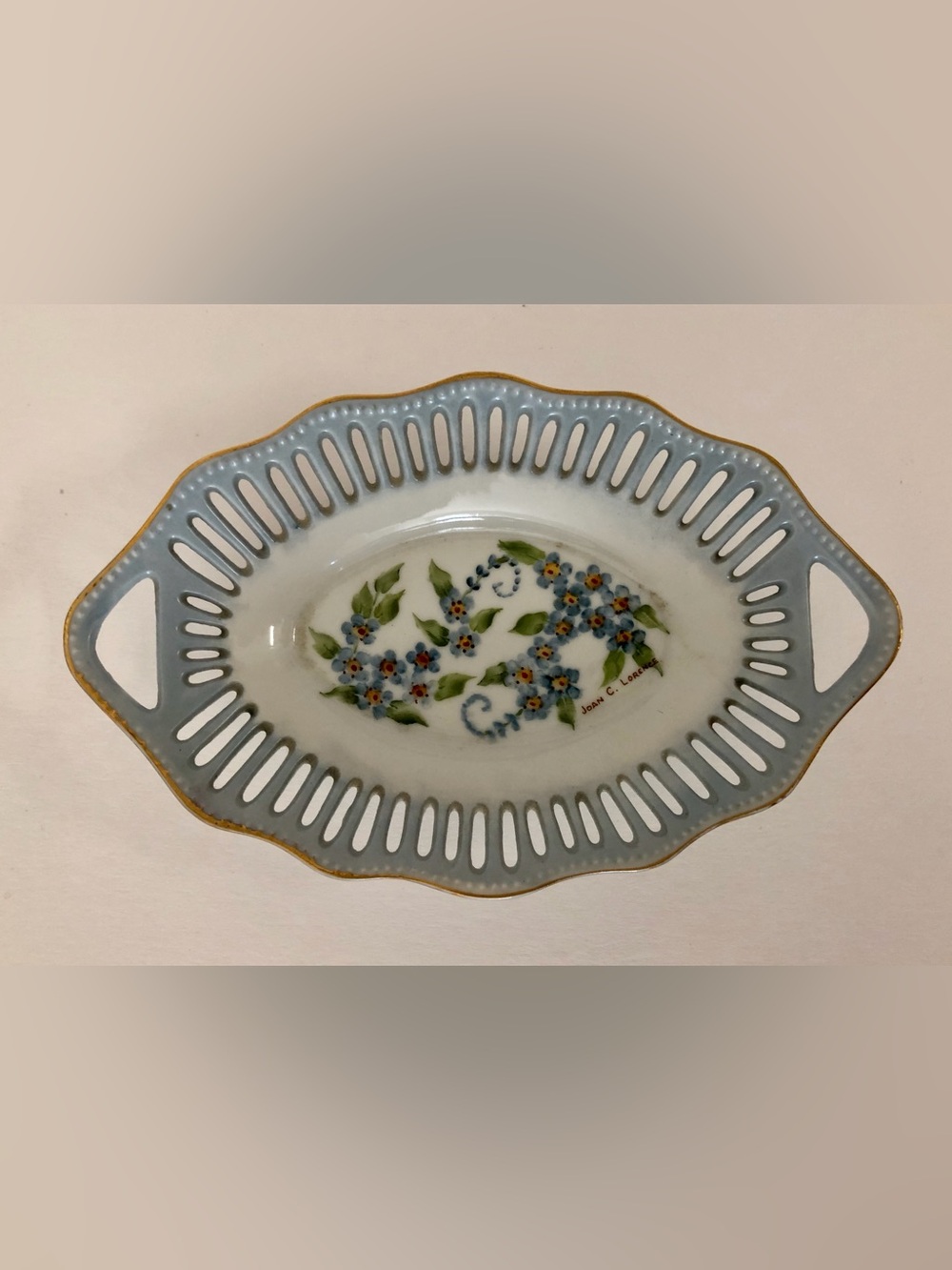 Handpainted Porcelain Floral Handled  Dish in Light Blue and Gold. Signed